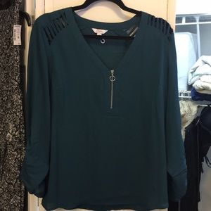 teal zip-up blouse
